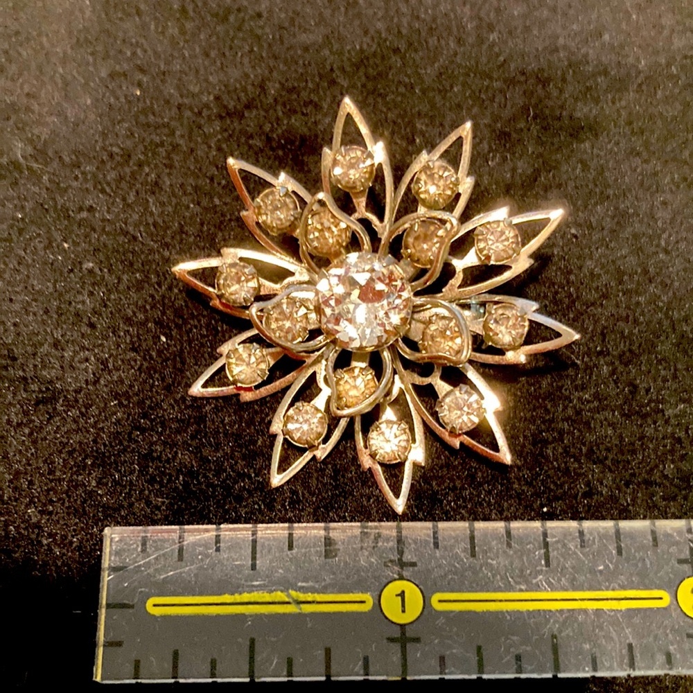 Vintage silver tone and rhinestone pin.